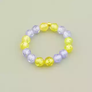 Каблучка з цирконом (гранованої форми, жовтого і фіолетового кольору)